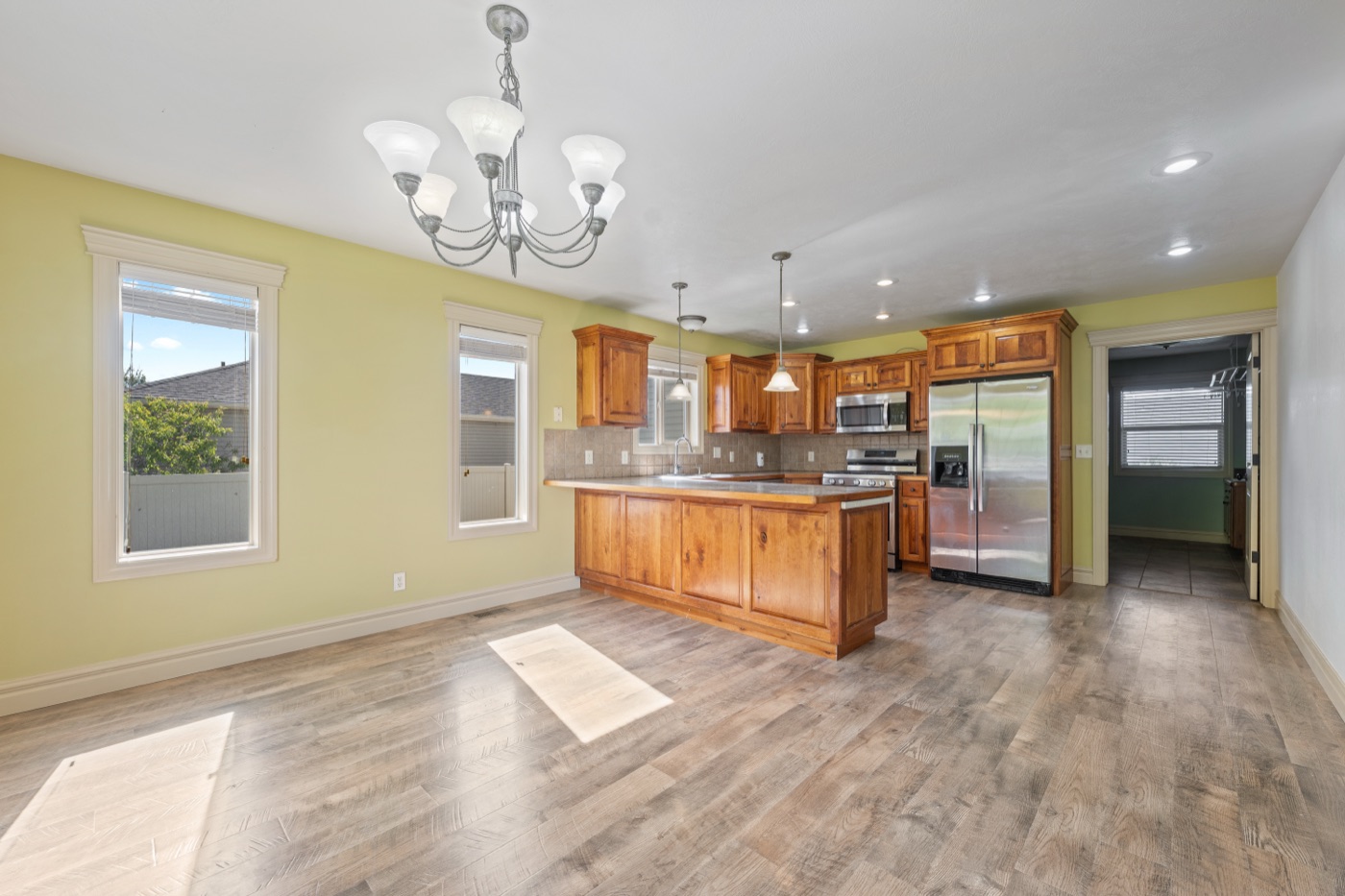 Wide kitchen view with peninsula bar